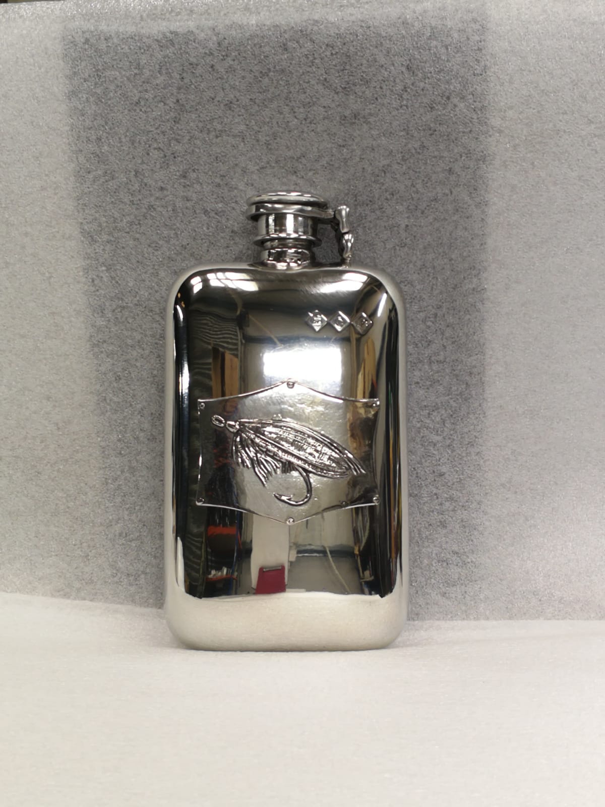 6oz stamped pewter flask with Fly Badge and captive top (F100)